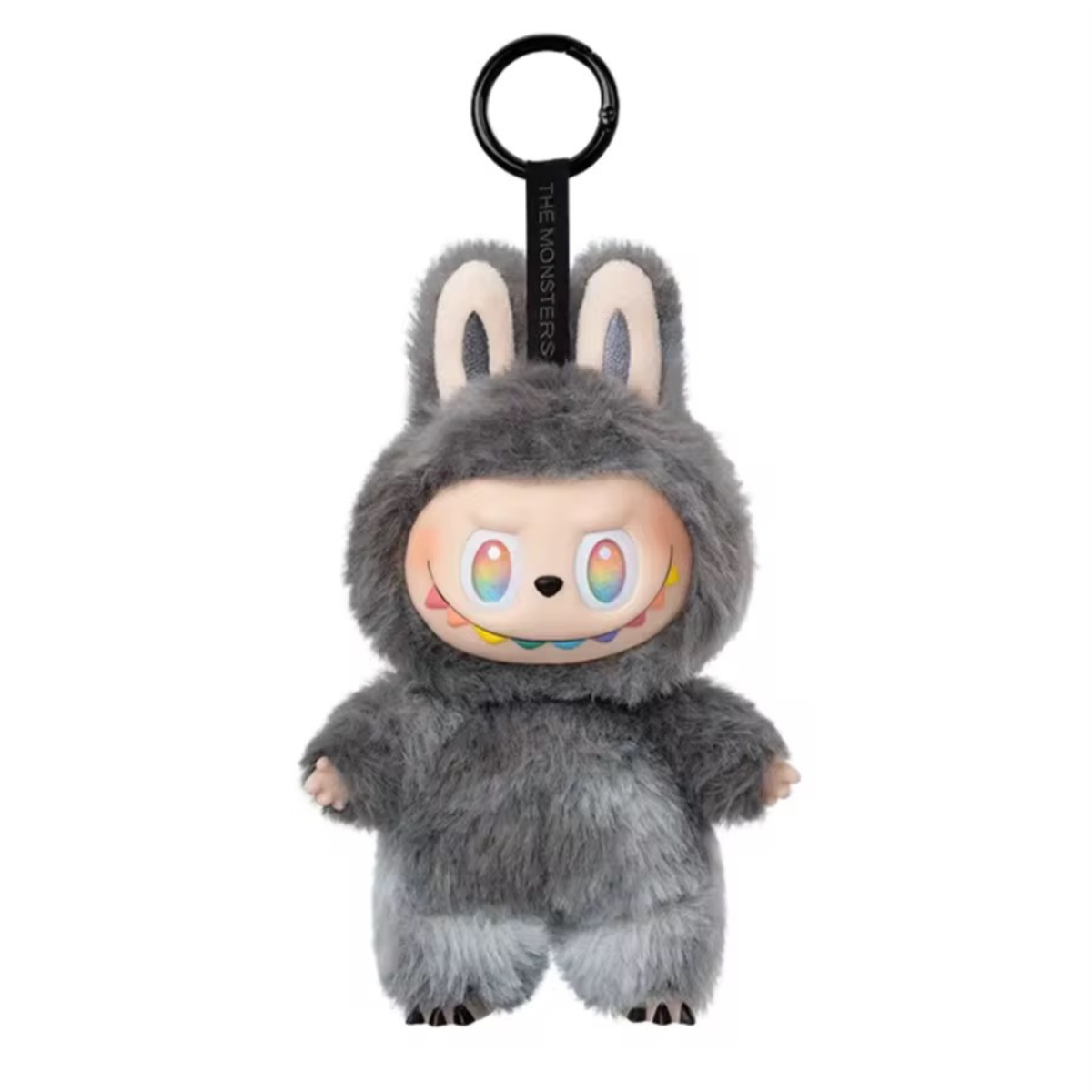 The Monsters Big into Energy keychain in grijs design met vrolijke expressie en oorringen
